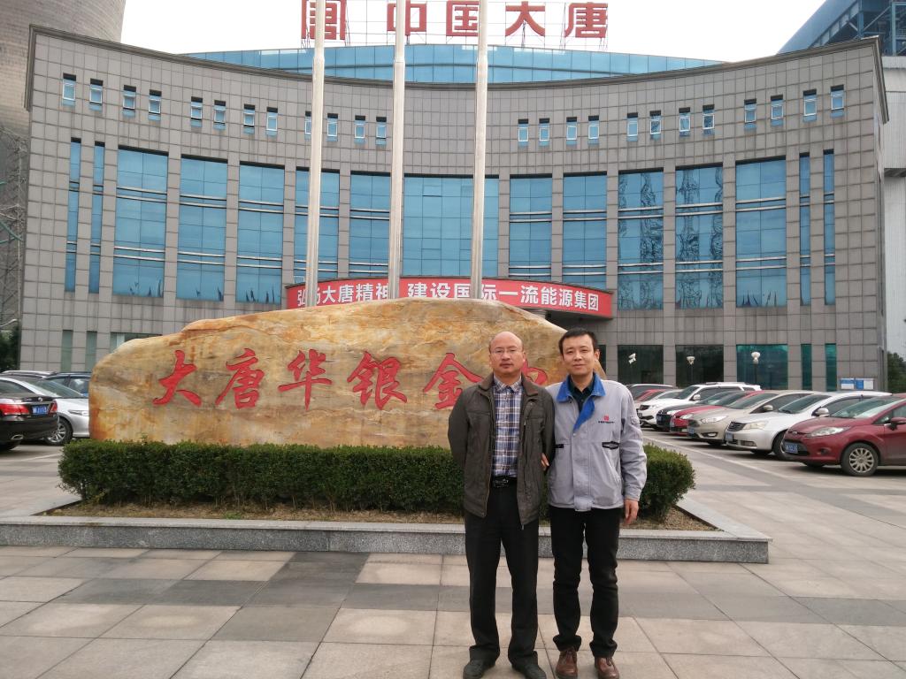 张峰老师和李劲夫主任合影